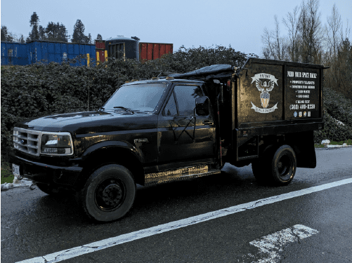 Patriot Hauling & Junk Removal with Black Truck gym and fitness equipment removal in Salem, OR