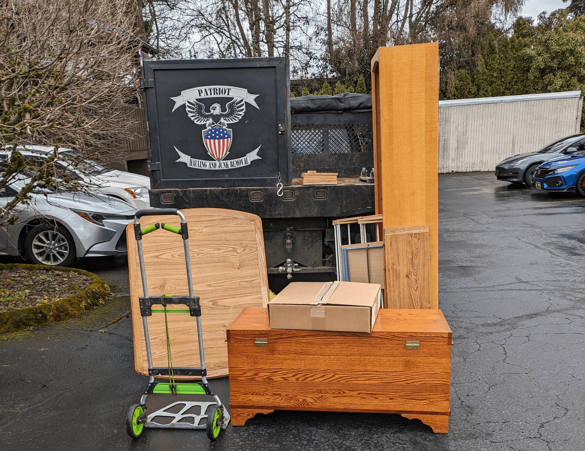 Patriot Hauling & Junk Removal | Look for the Black Truck One call to Patriot Hauling & Junk Removal to haul away furniture